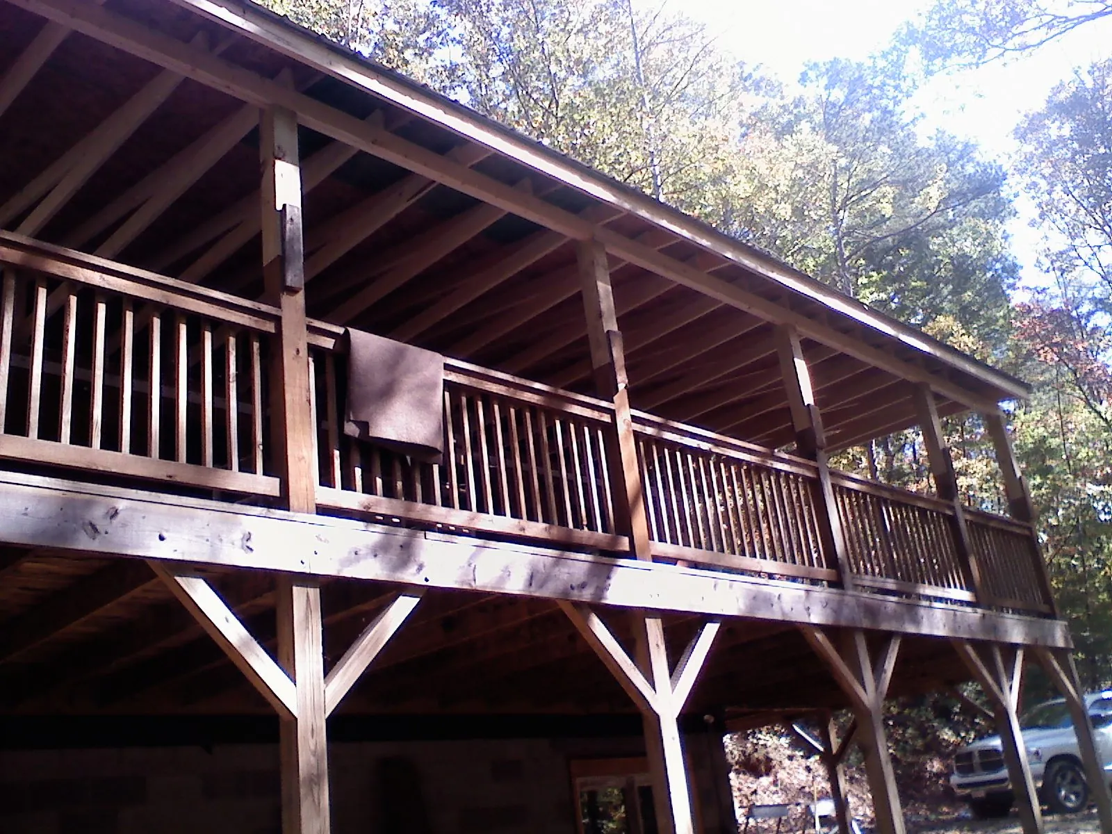 Timber framing under a new elevated porch and deck — Roof Leak Repair in Granville by Roofing Brothers